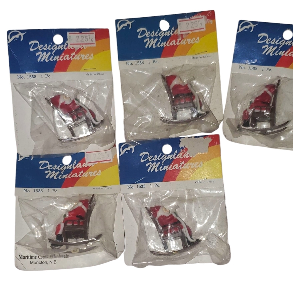 Vintage miniature plastic santas